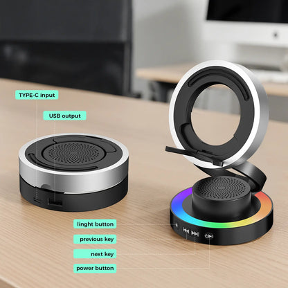VANOTOM 5-in-1 Wireless Speaker Phone Stand with Bluetooth Speaker, Power Bank, and RGB Lighting - Foldable Design Compatible with All Phones